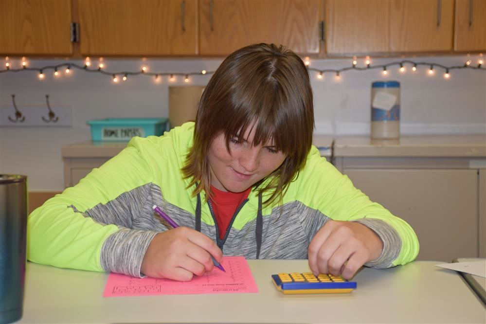 A student working on a math problem.